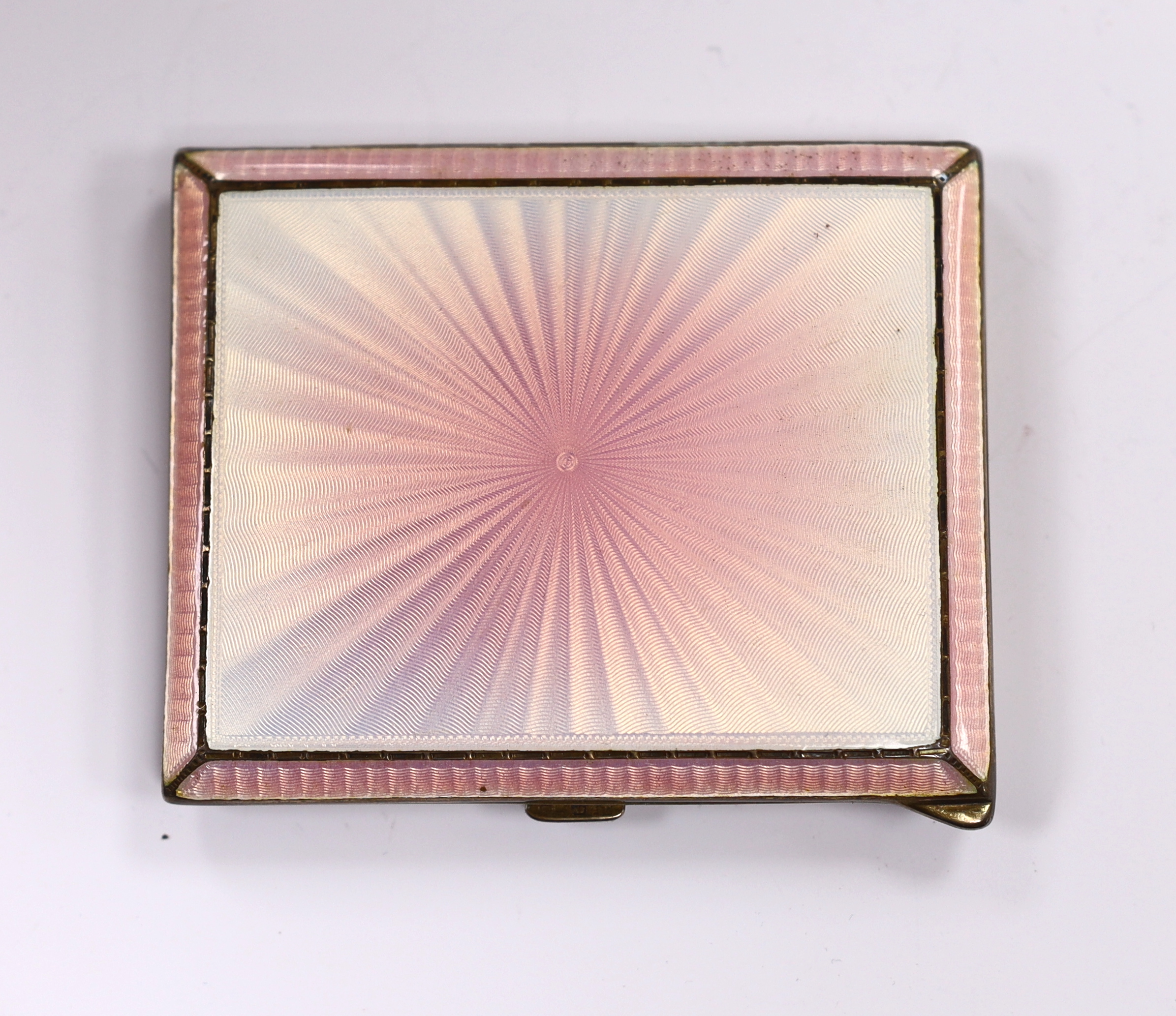 A George VI silver pink guilloche enamel cigarette case, by Albert Carter, Birmingham, 1938, 81mm.